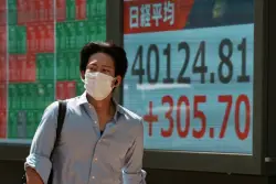 World markets are mixed and Japan’s shares dip after election leaves Ishiba’s future in doubt